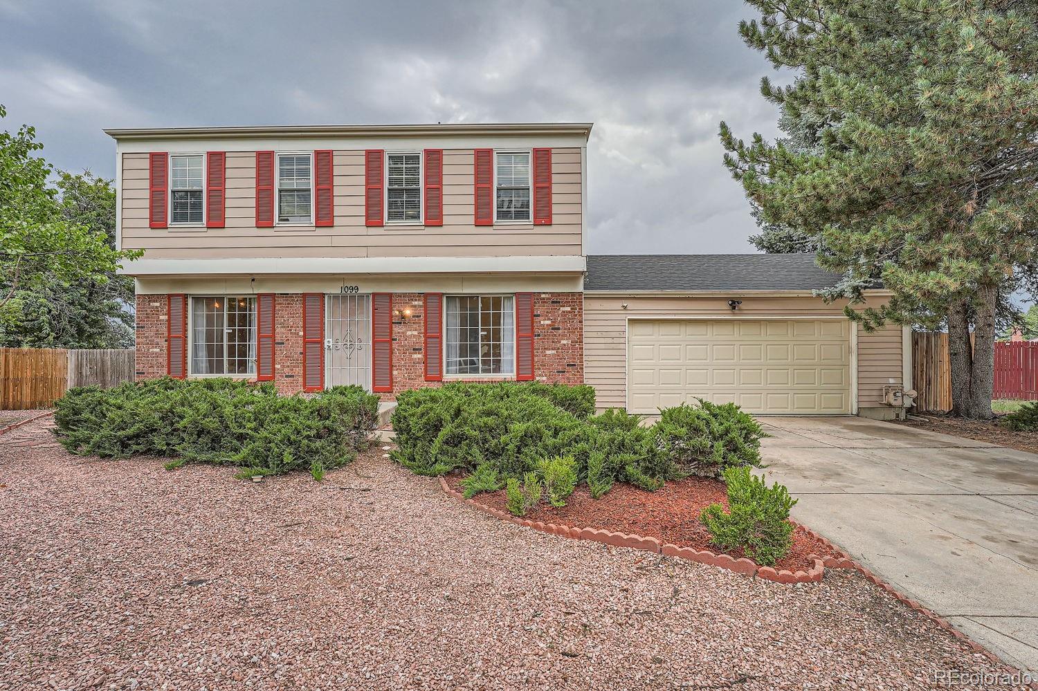 front view of house with a yard