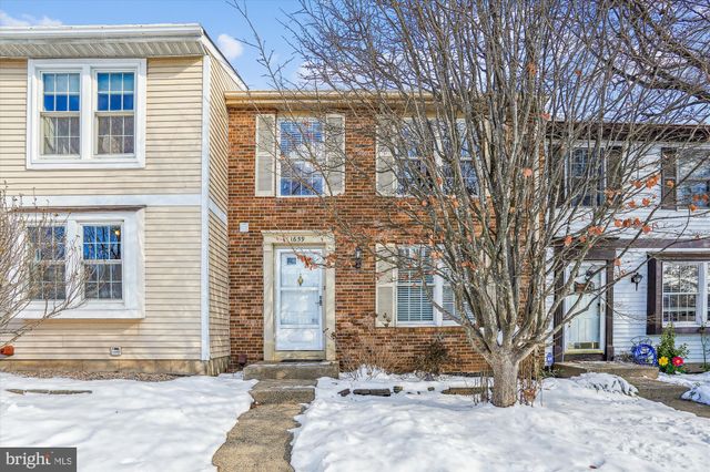 $575,000 | 1659 Sierra Woods Drive | Reston