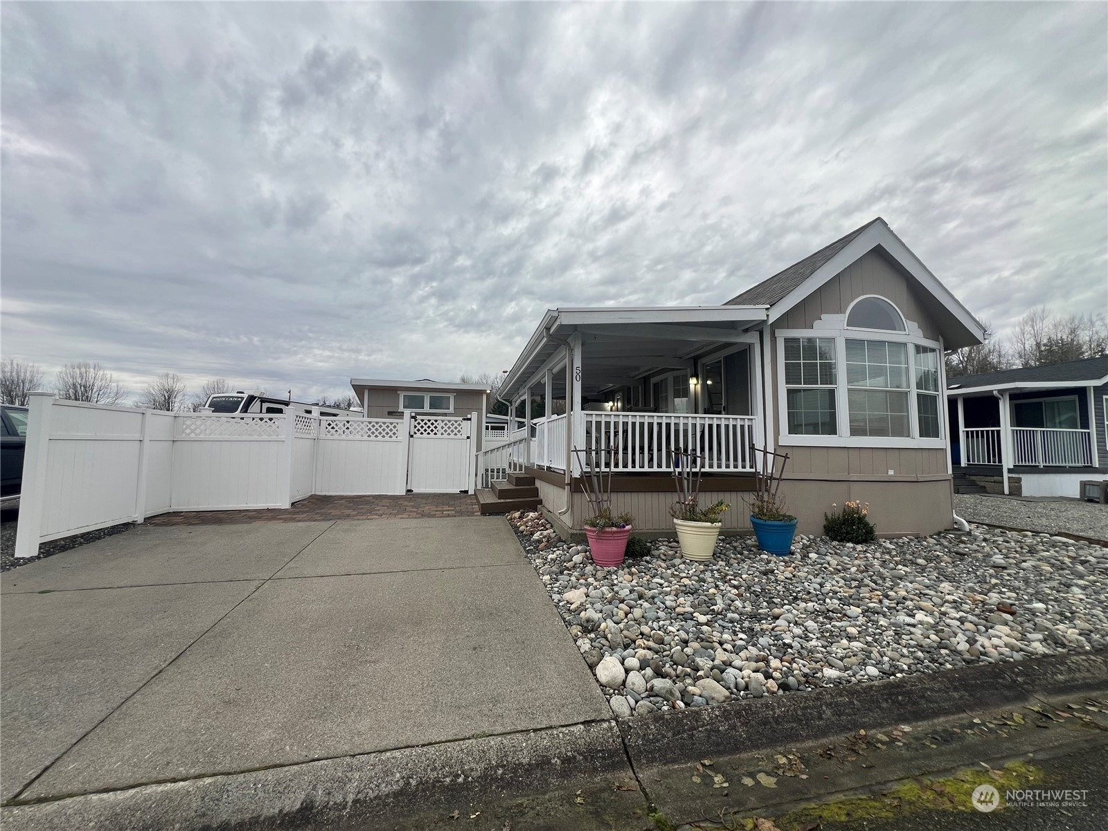 a front view of a house with balcony