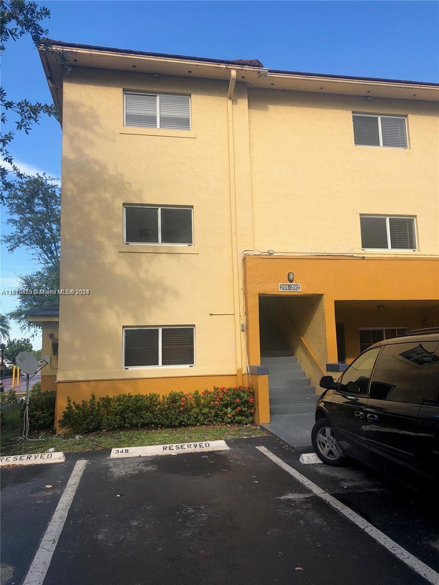 a car parked in front of a building