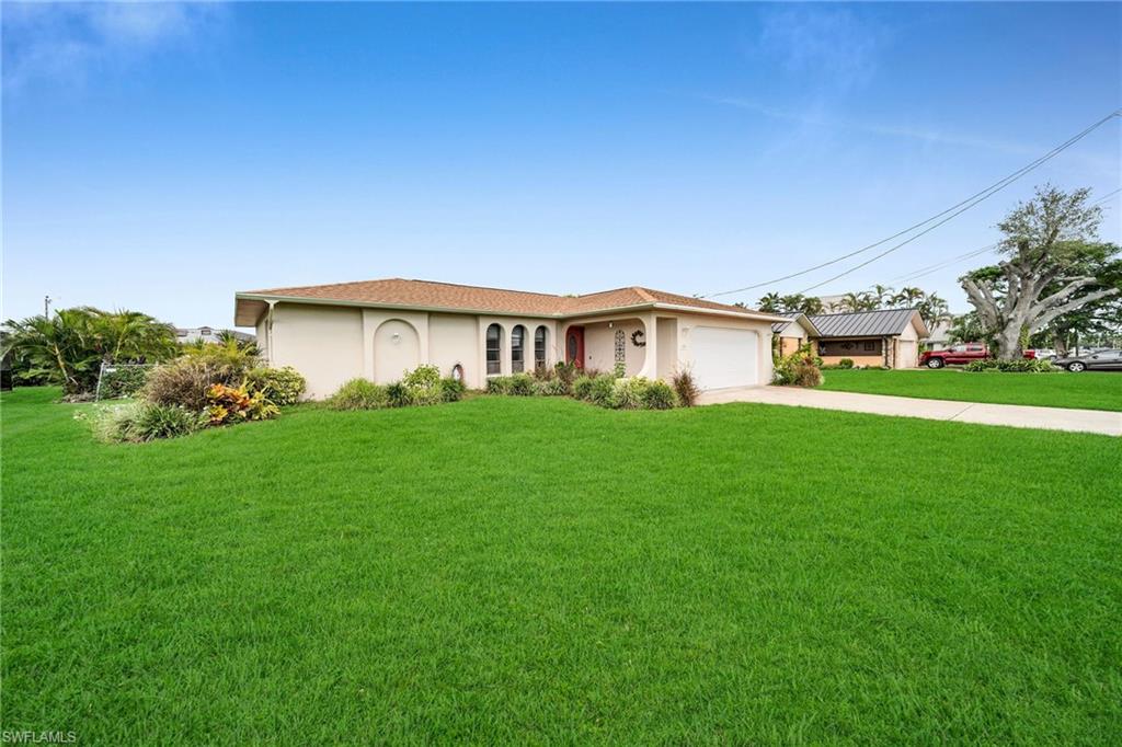 a house view with garden space