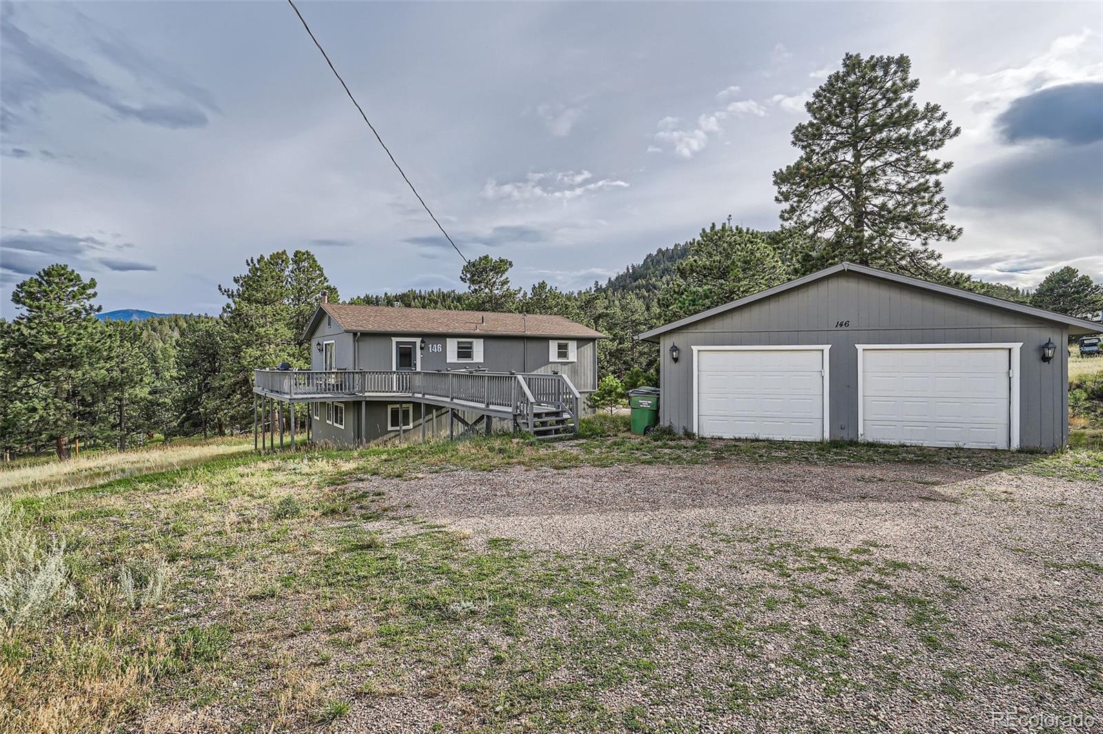 a view of front of a house with a yard