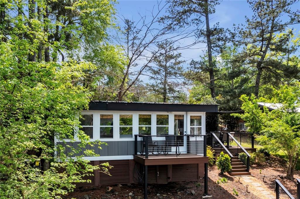 a house view with sitting space and garden space