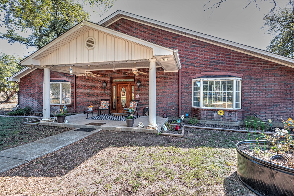 a front view of a house with patio