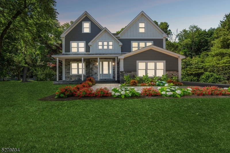 a front view of a house with a garden