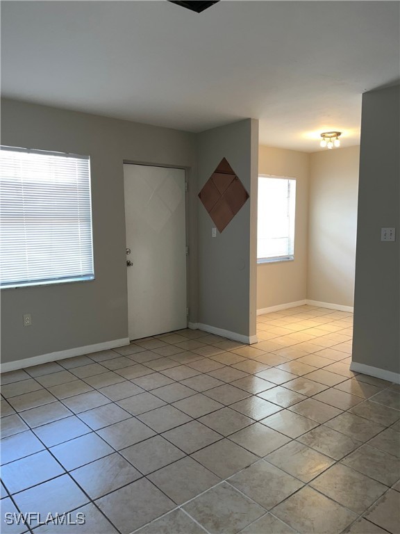 a view of an empty room and window