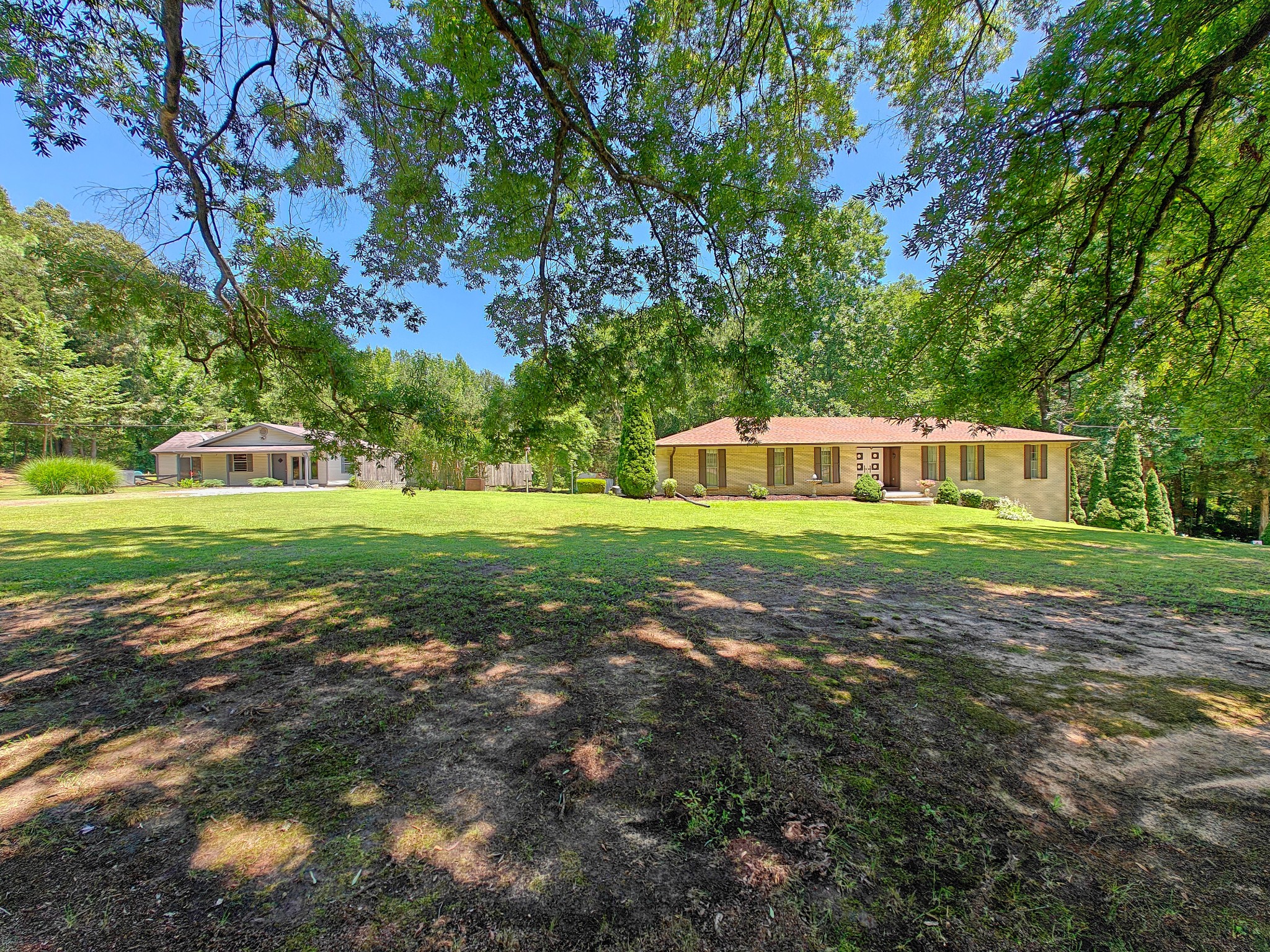 a view of a house with a big yard