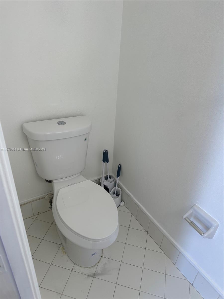 a bathroom with a toilet and a sink