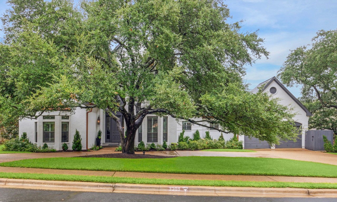 Front of house and circular driveway