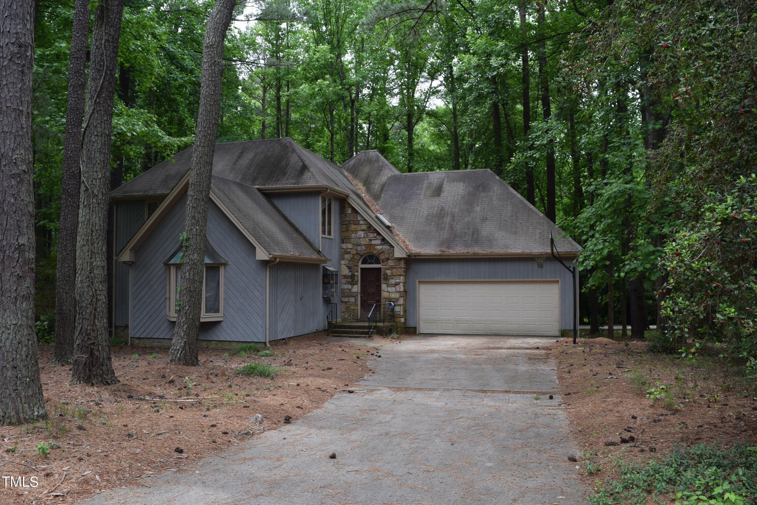 front view of a house with a small yard