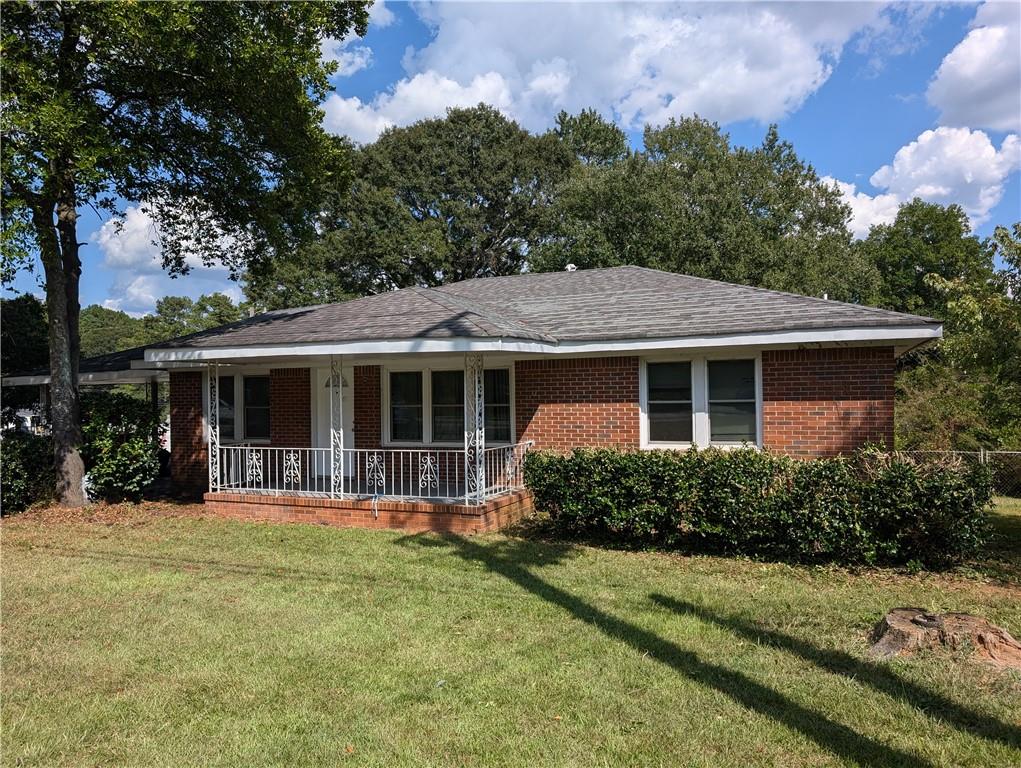 front view of a house with a yard