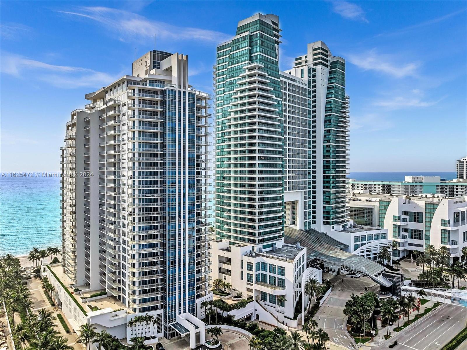 a view of a city with tall buildings