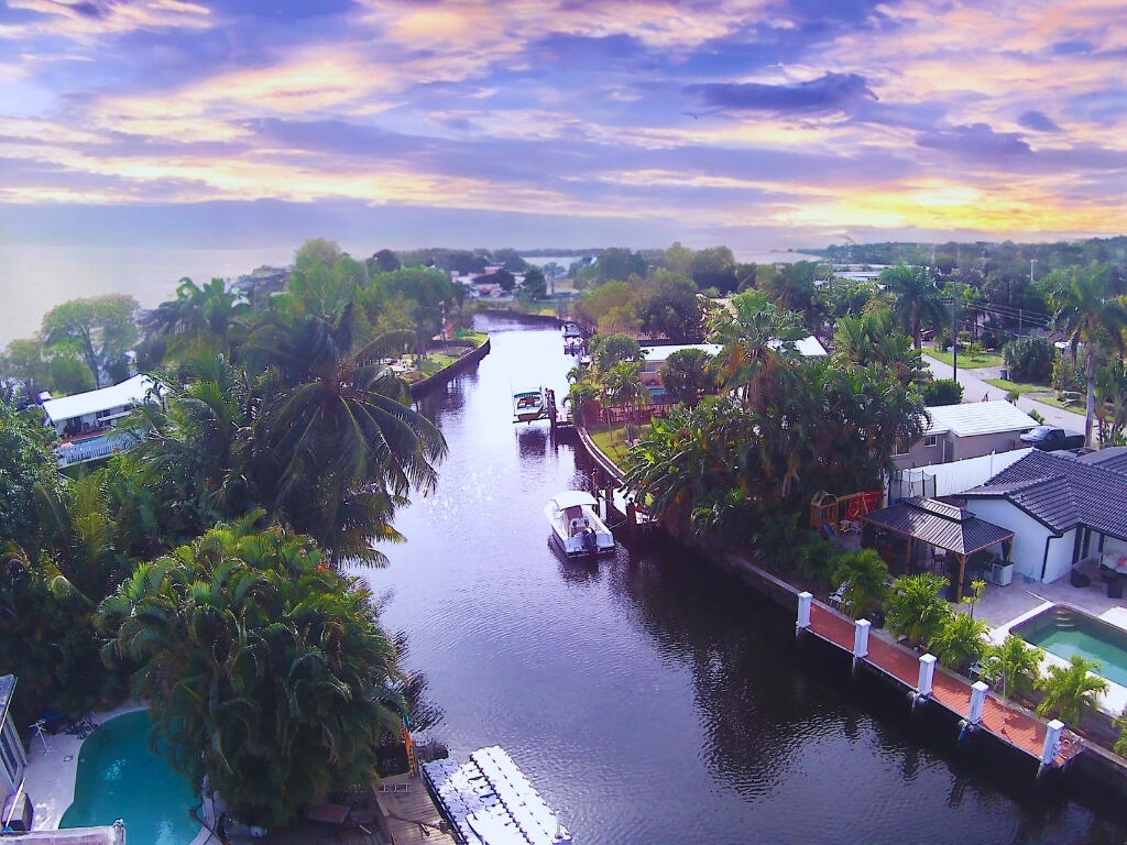 an aerial view of a houses with outdoor space