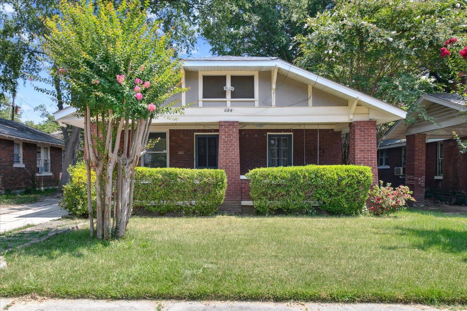 View of front of home with a front yard