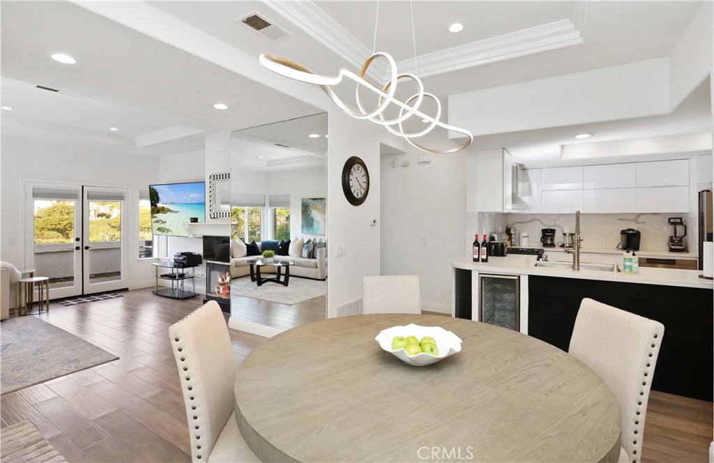 a view of a dining room and livingroom with furniture