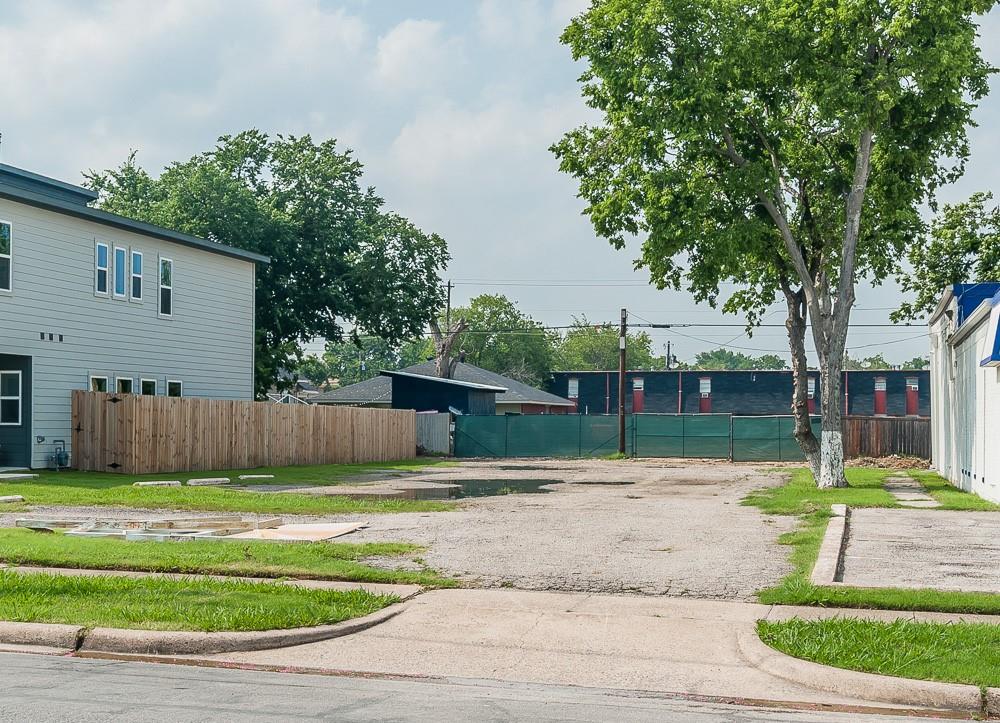 a house with swimming pool in front of it