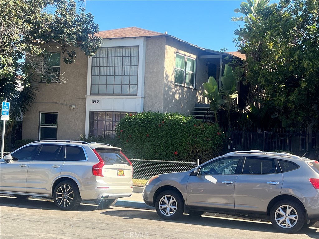 a car parked in front of a house