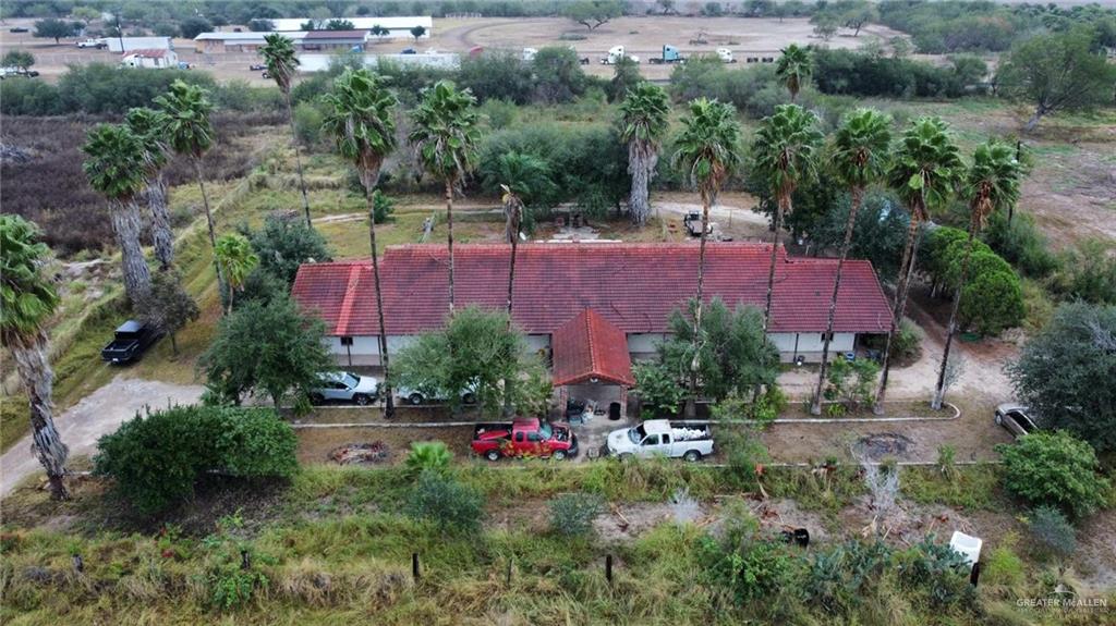 an aerial view of a house and yard