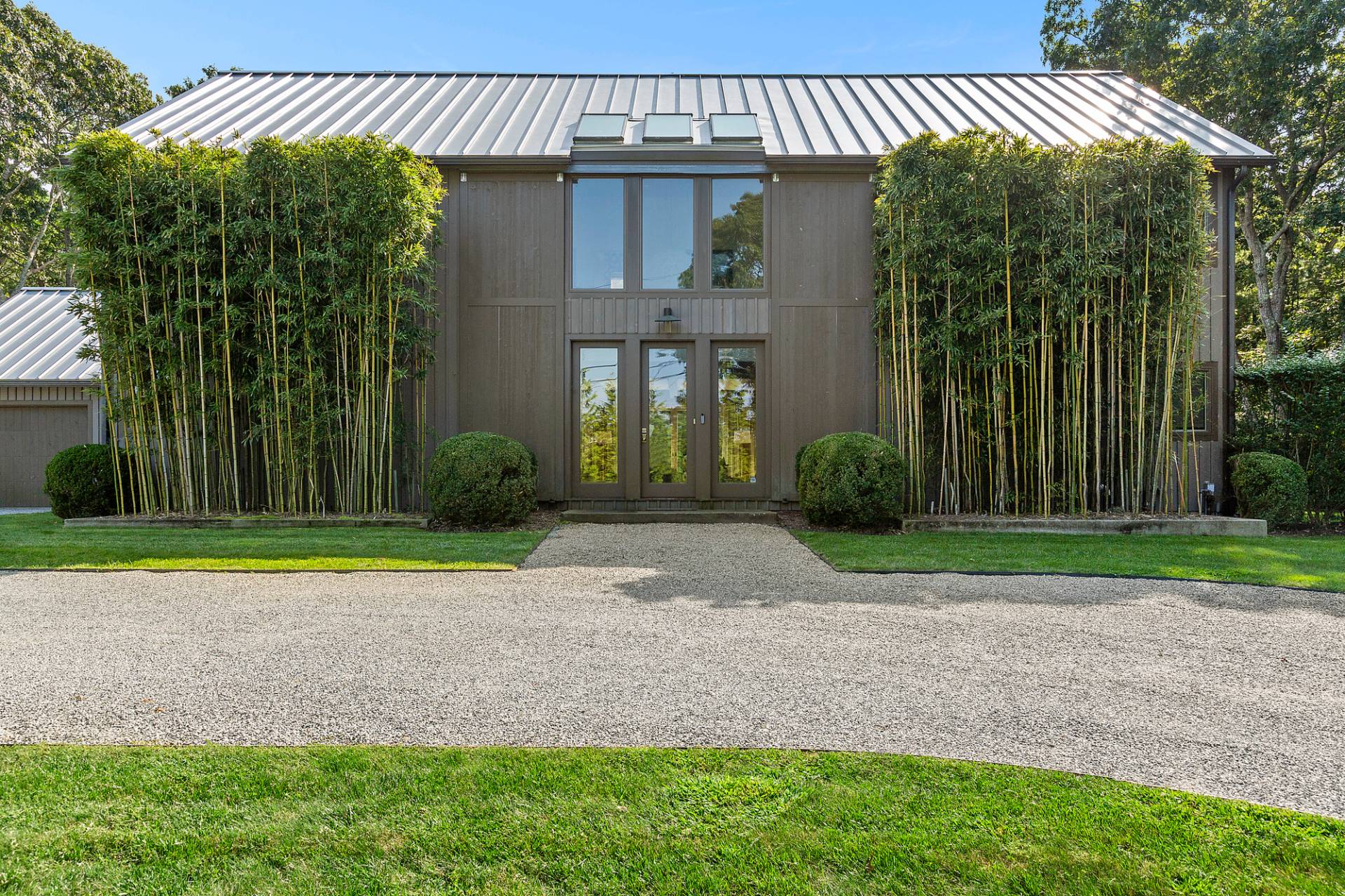 a front view of a house having yard