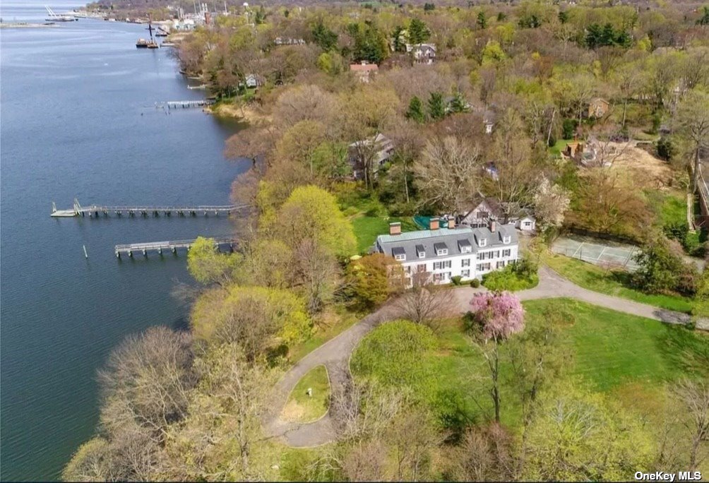 a aerial view of a house with a yard