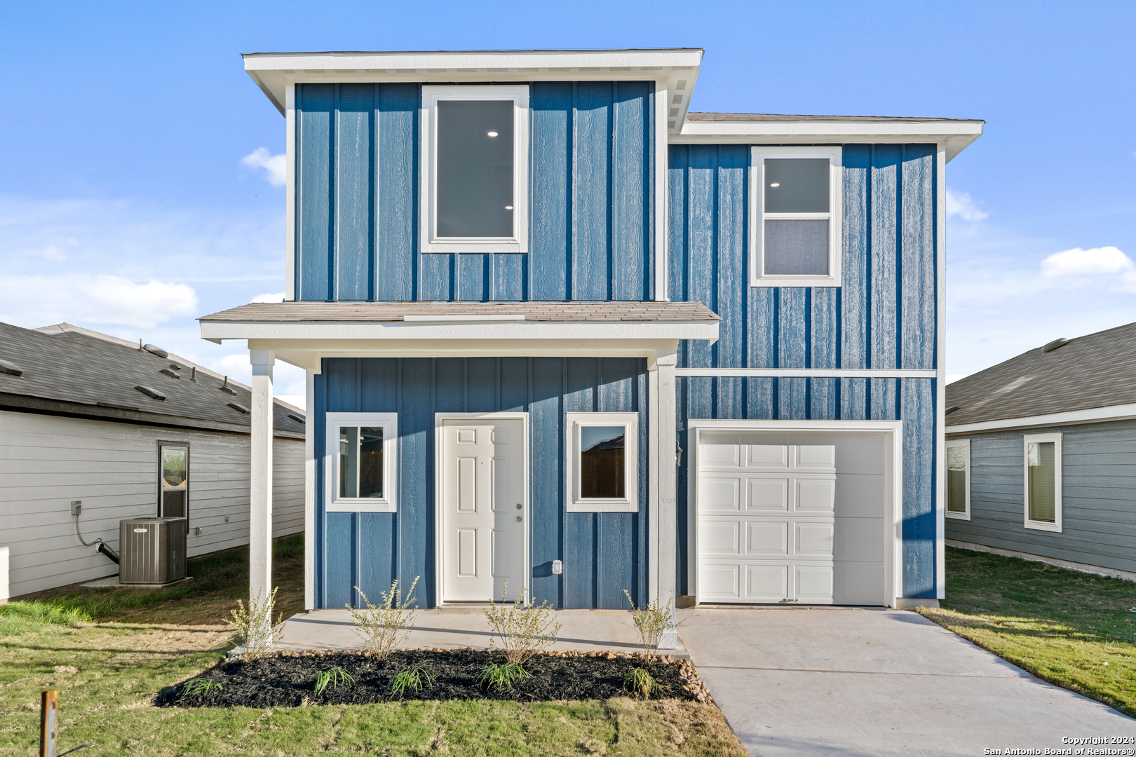 a view of outdoor space yard and front view of a house