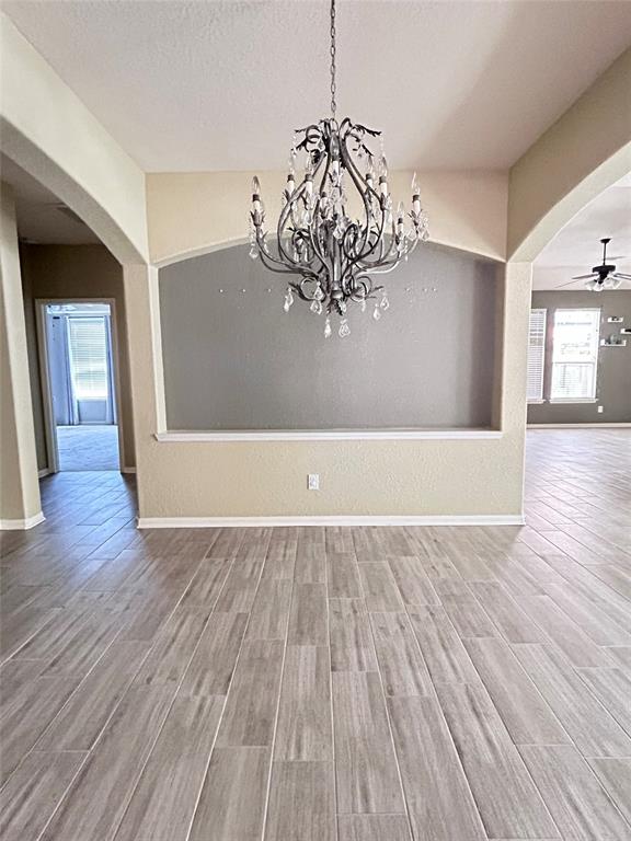 a view of a livingroom with wooden floor