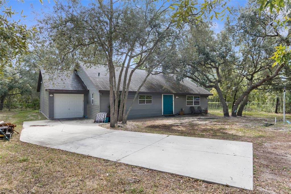 a house with trees in front of it