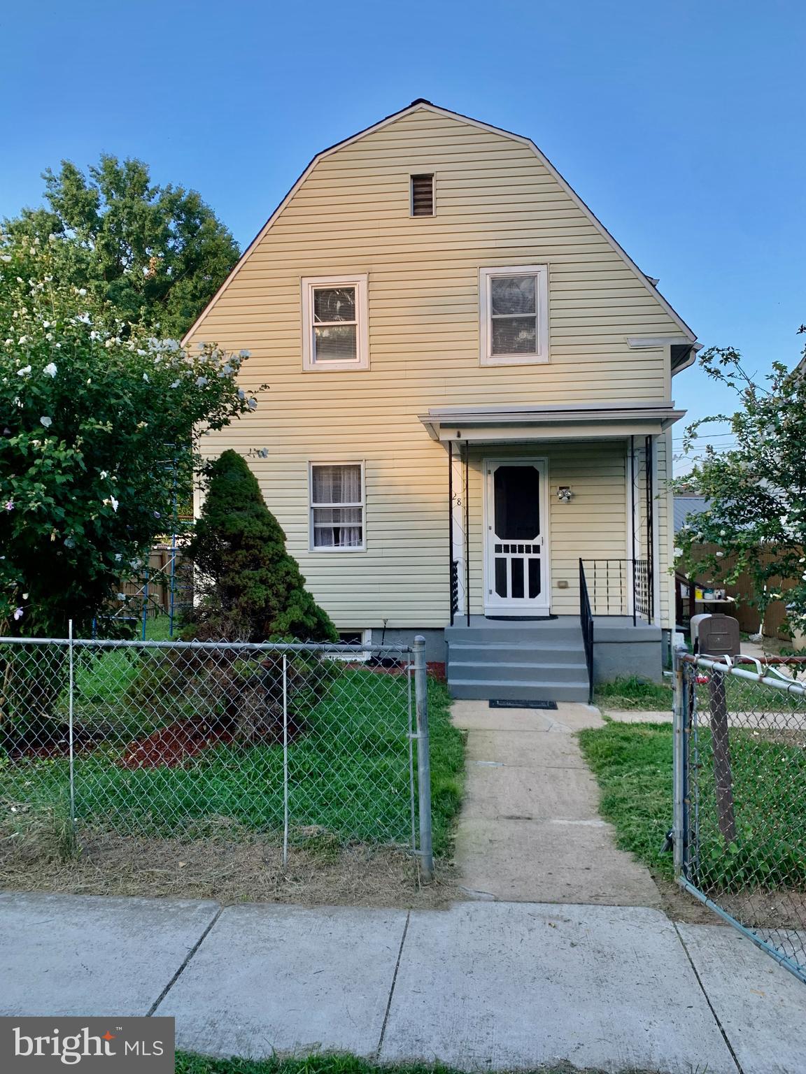 a front view of house with yard