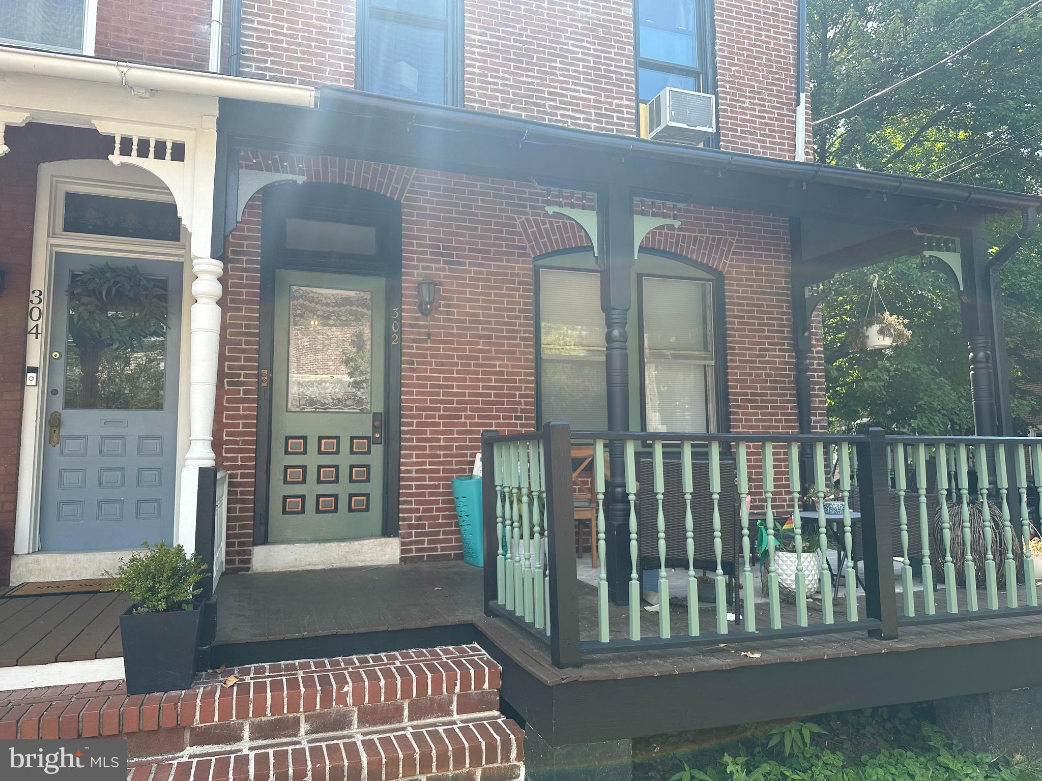 a view of a balcony with a floor to ceiling window