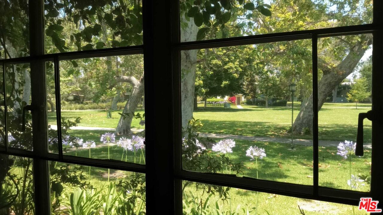 a view of outdoor space with a lake view