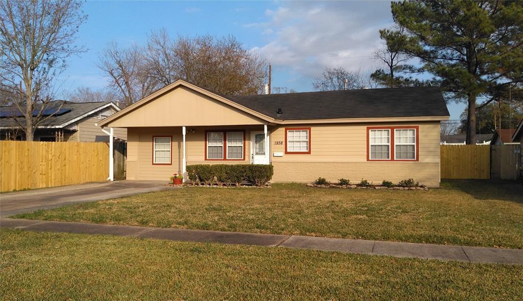 a house with yard in front of it