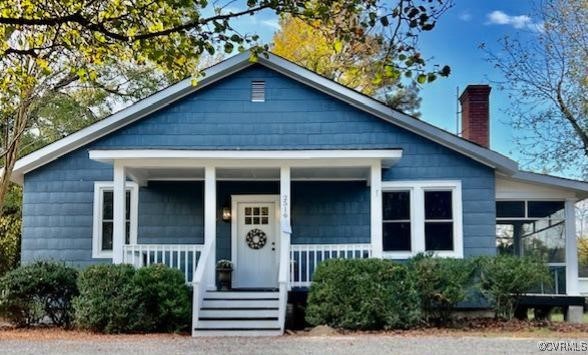 Bungalow-style house with covered porch