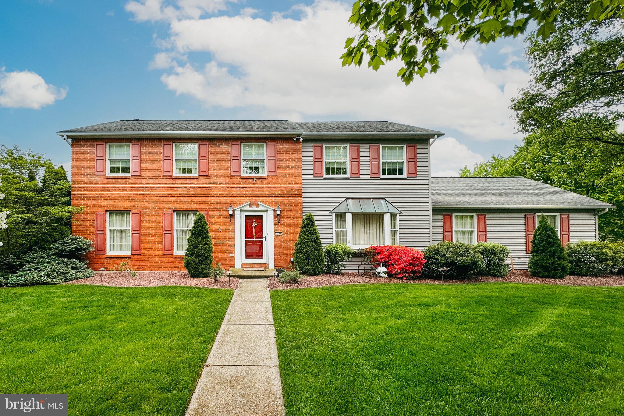 a front view of house with yard