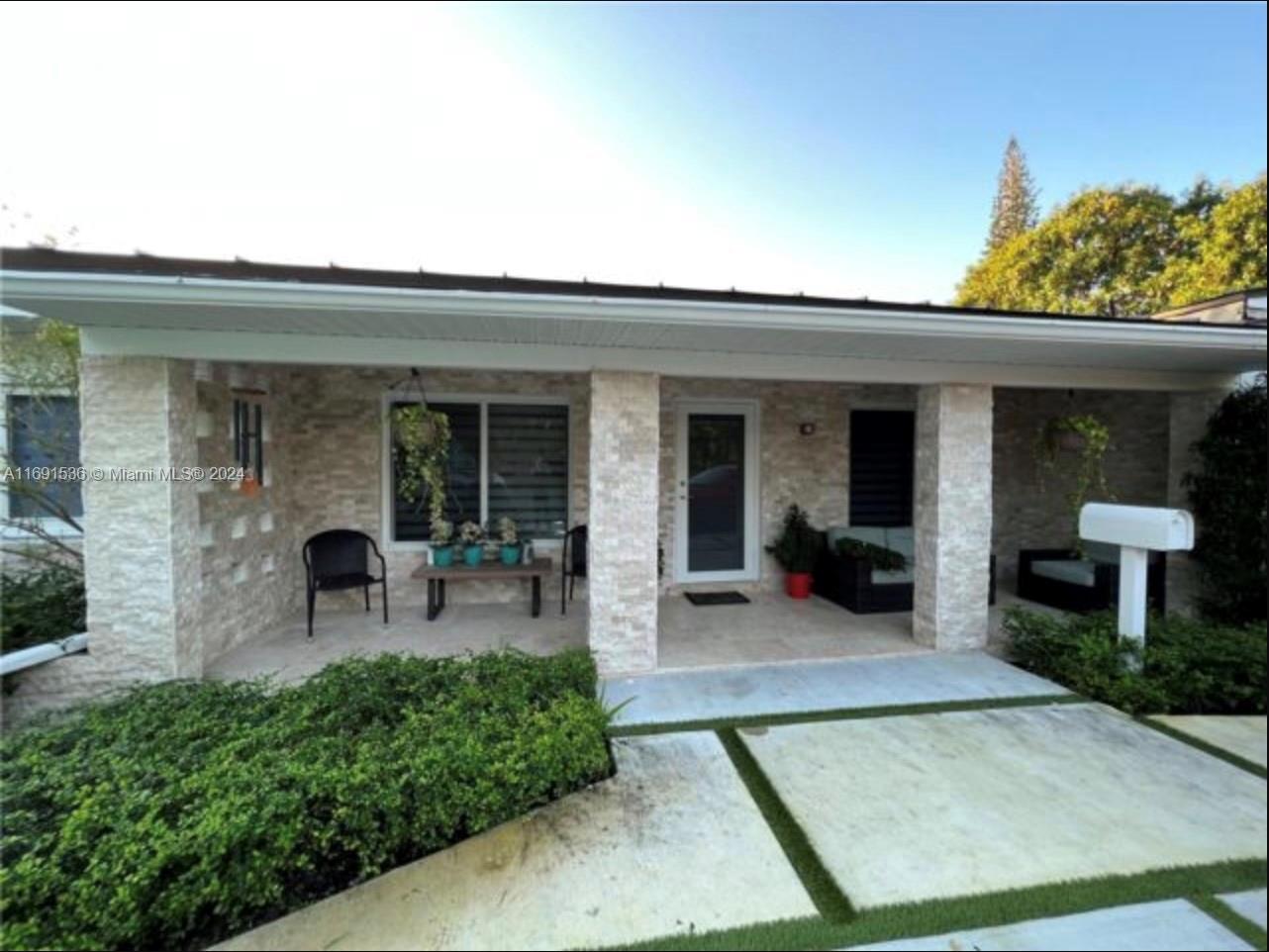 a view of a house with patio