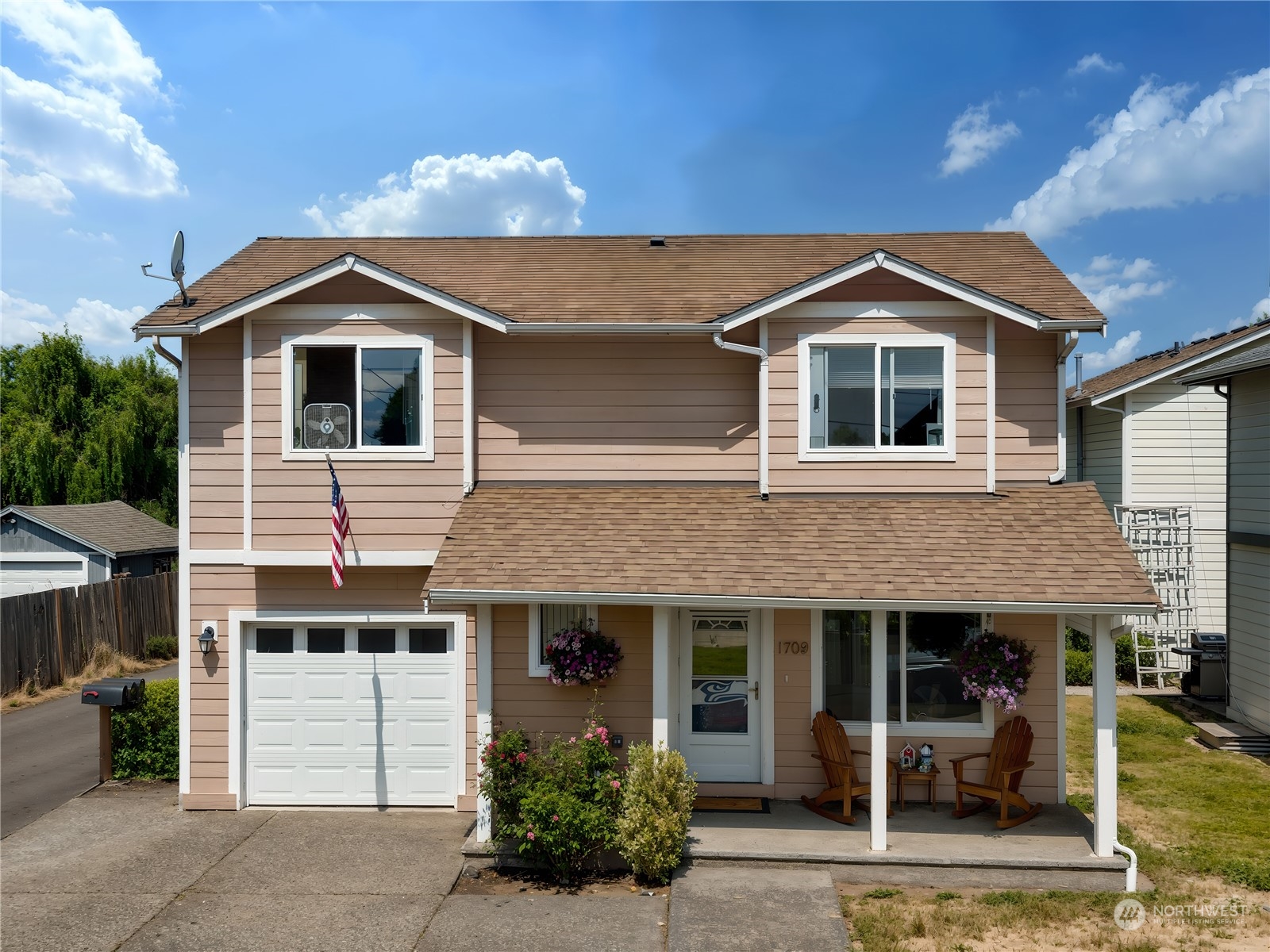 a front view of a house with a yard