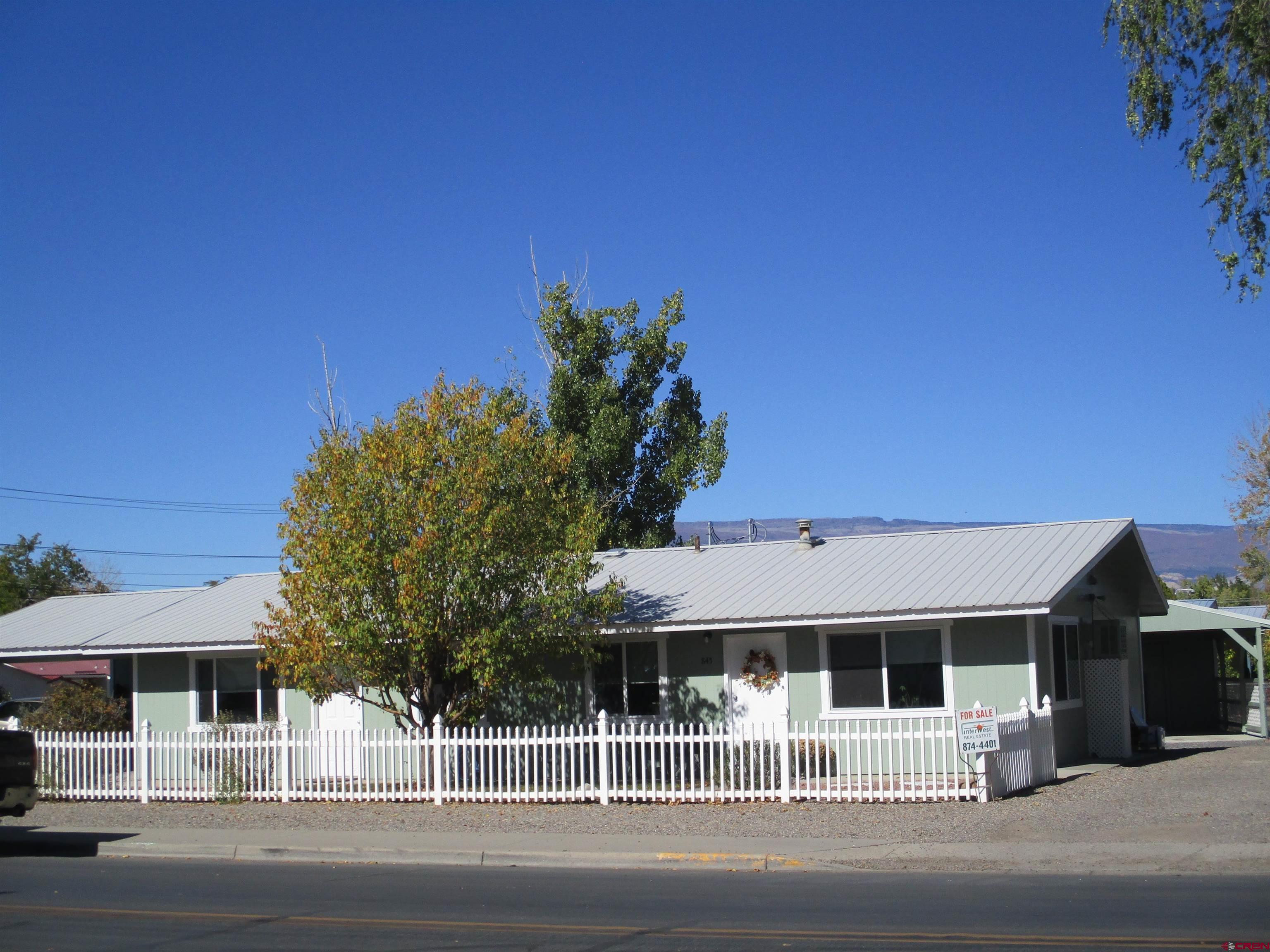 a view of a building with a street