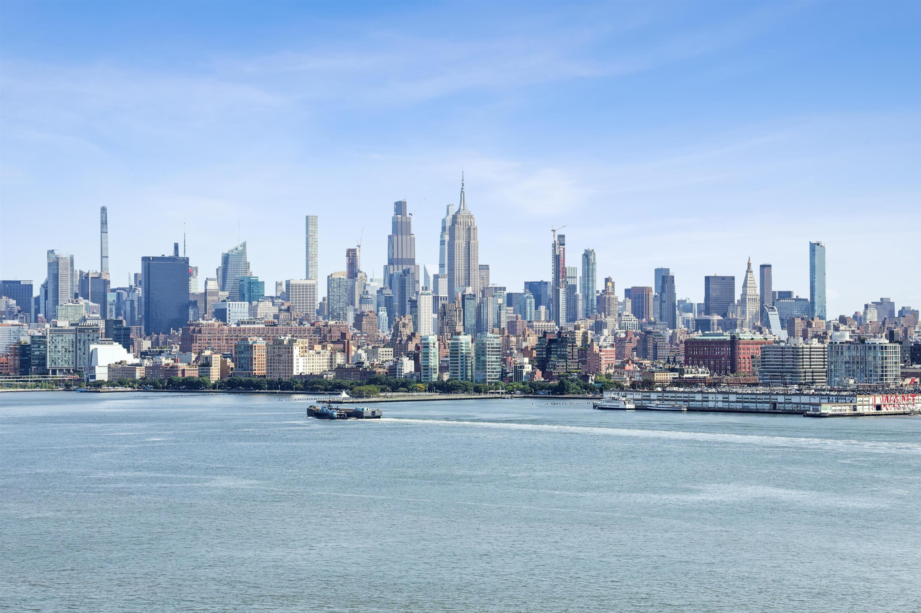 a view of a city with tall buildings