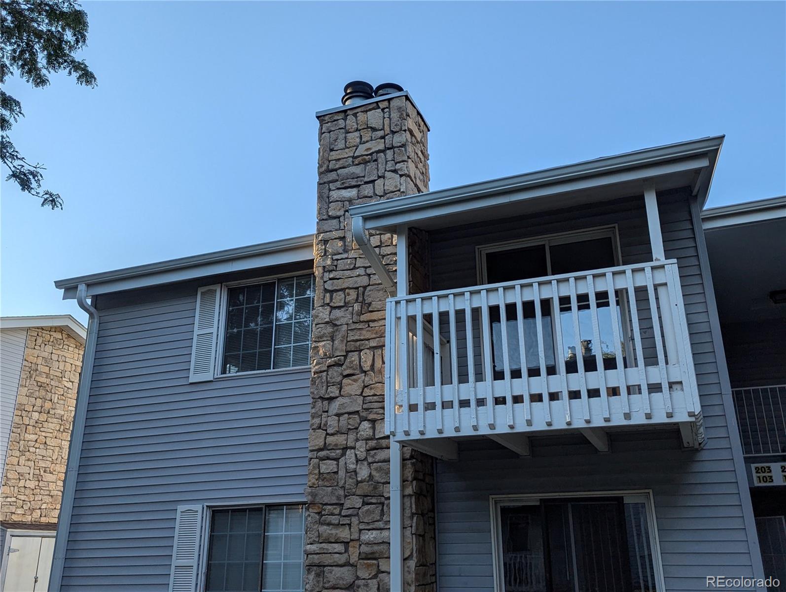 a view of a house with a deck