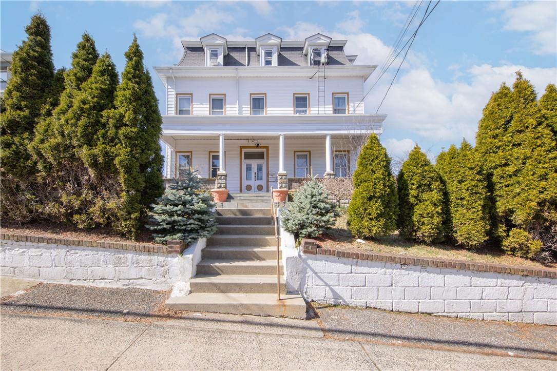 front view of house with a yard