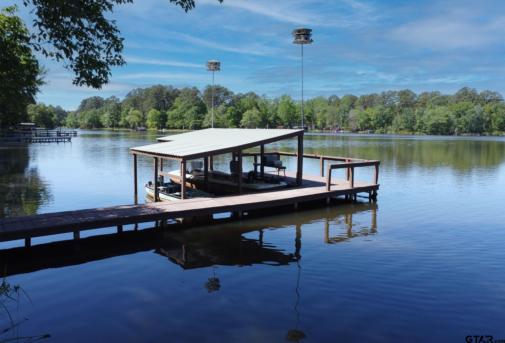 a view of a lake with a deck