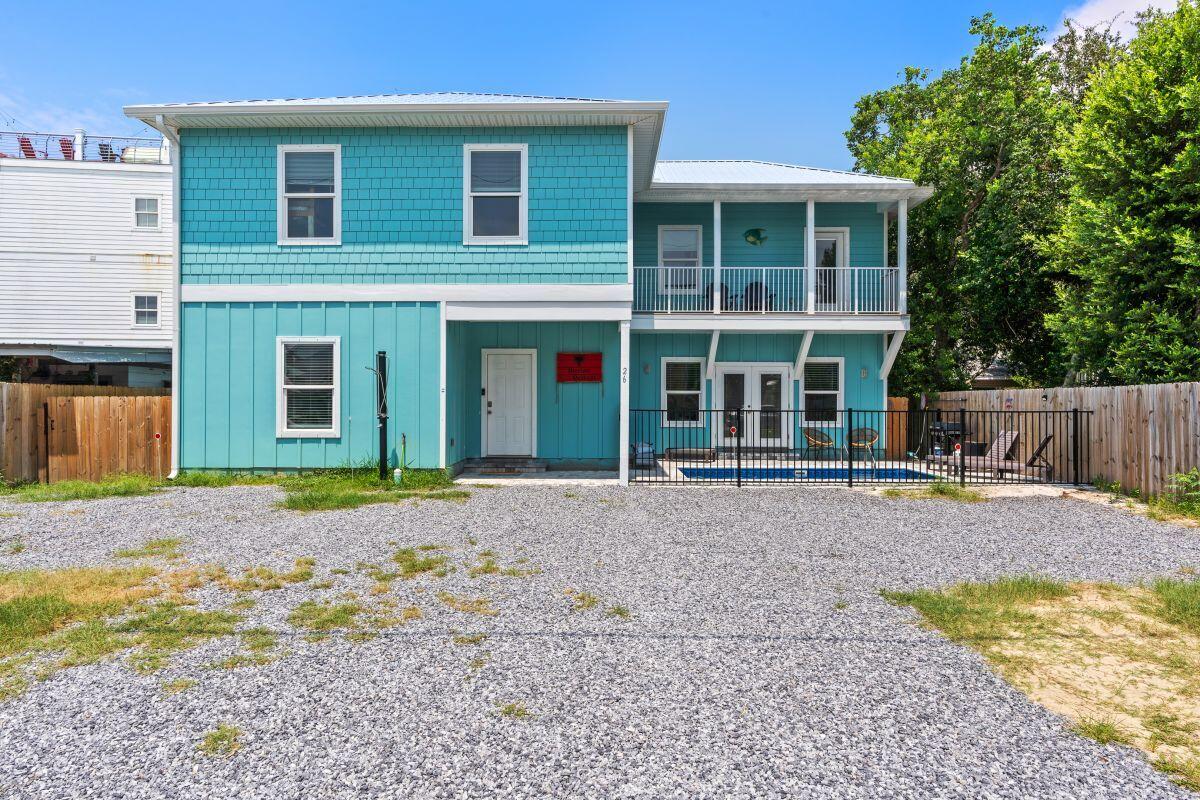 a house with yard in front of it