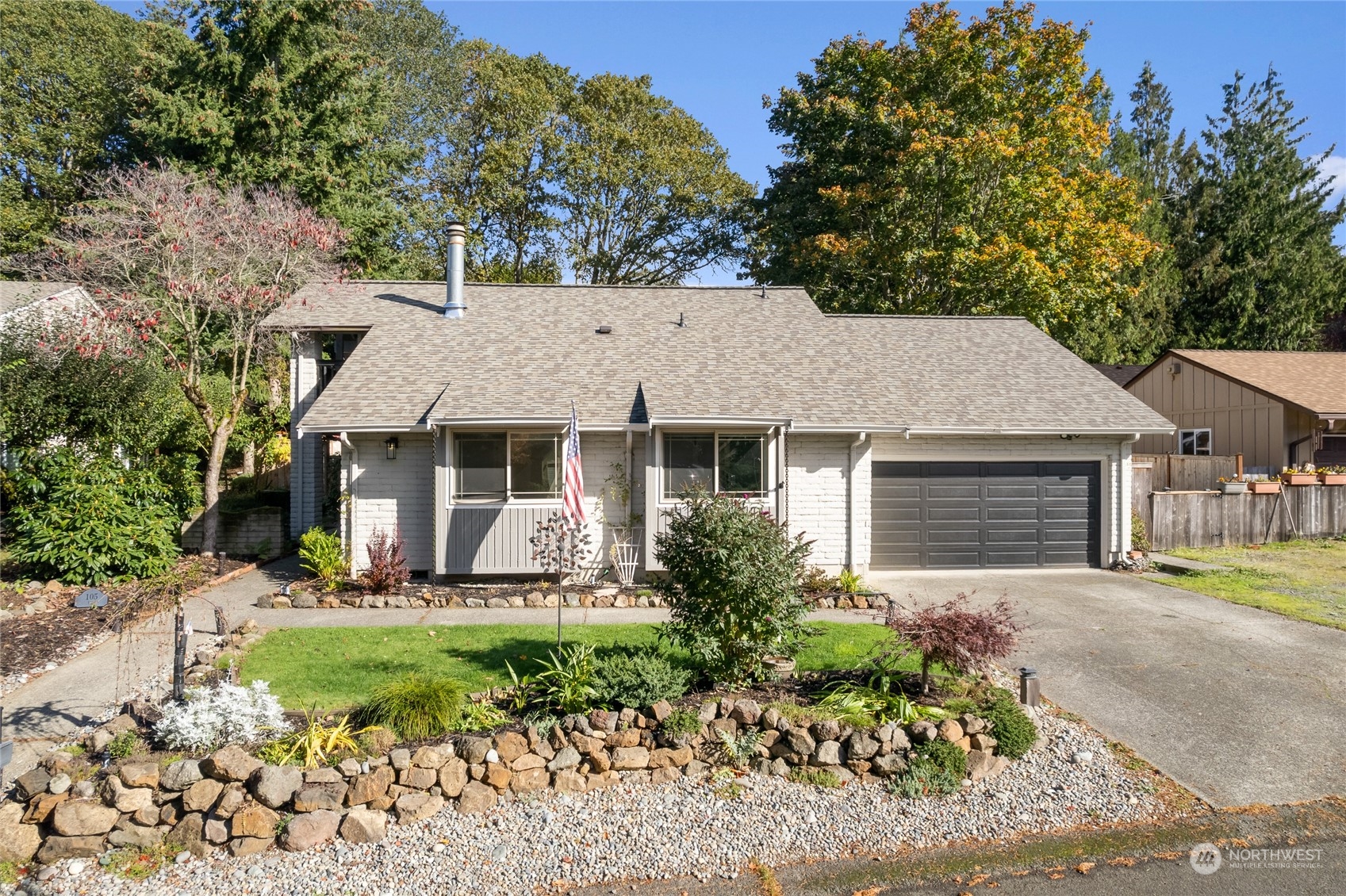 front view of a house with a yard