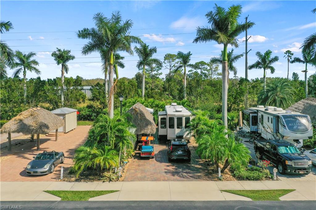 a picture of houses with palm trees