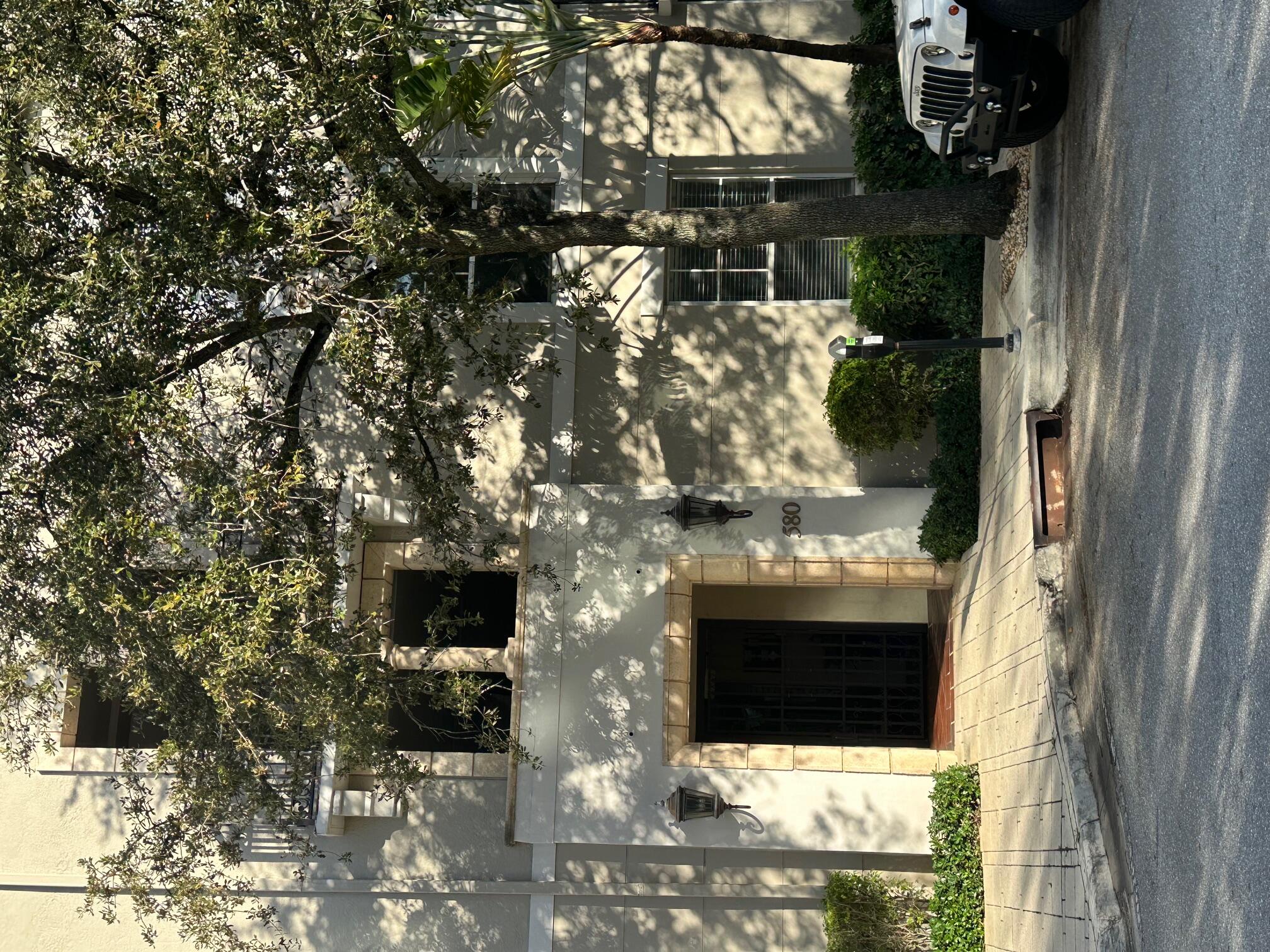 a view of a building with a street