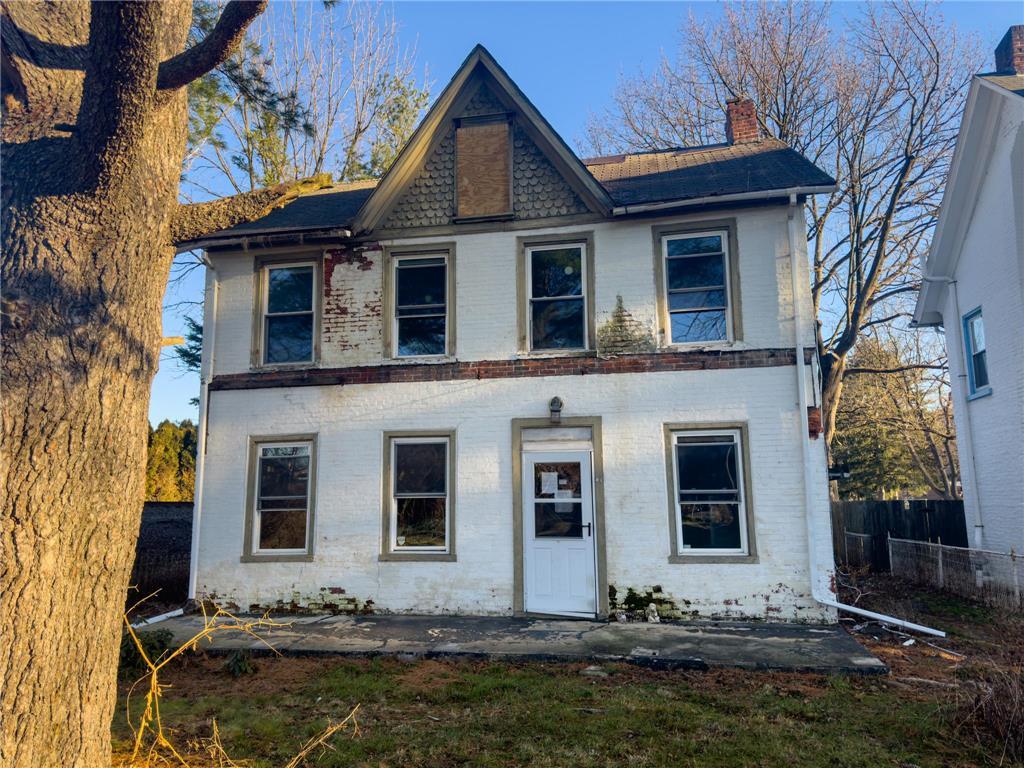 a front view of house with yard