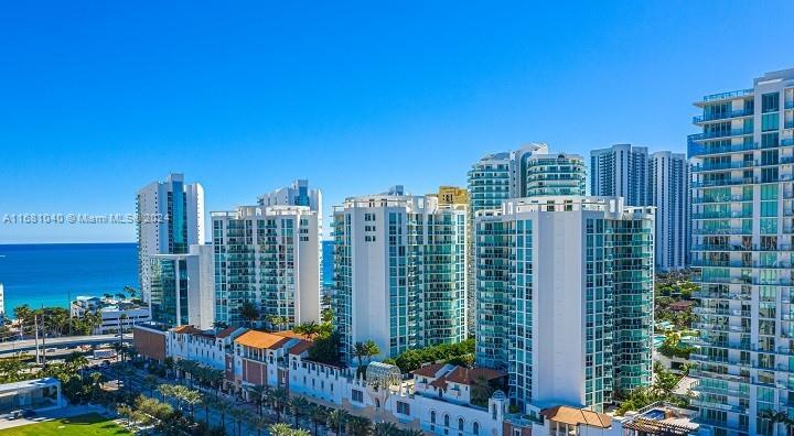 a city view with tall buildings