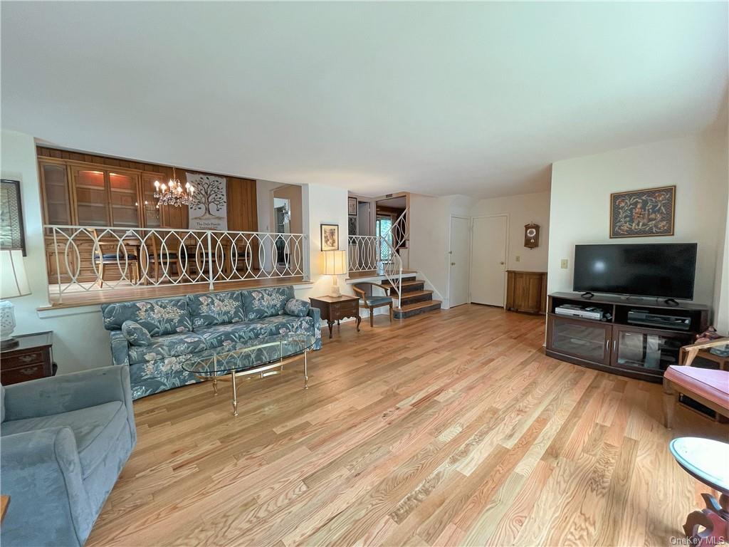 Living room with NEW natural colored hardwood floors