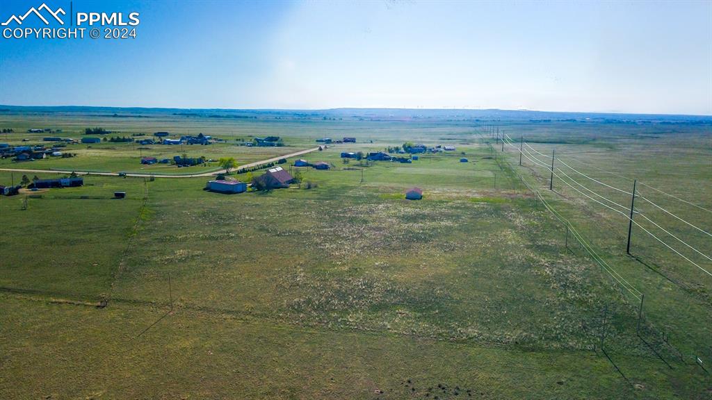 a view of a field with an outdoor space