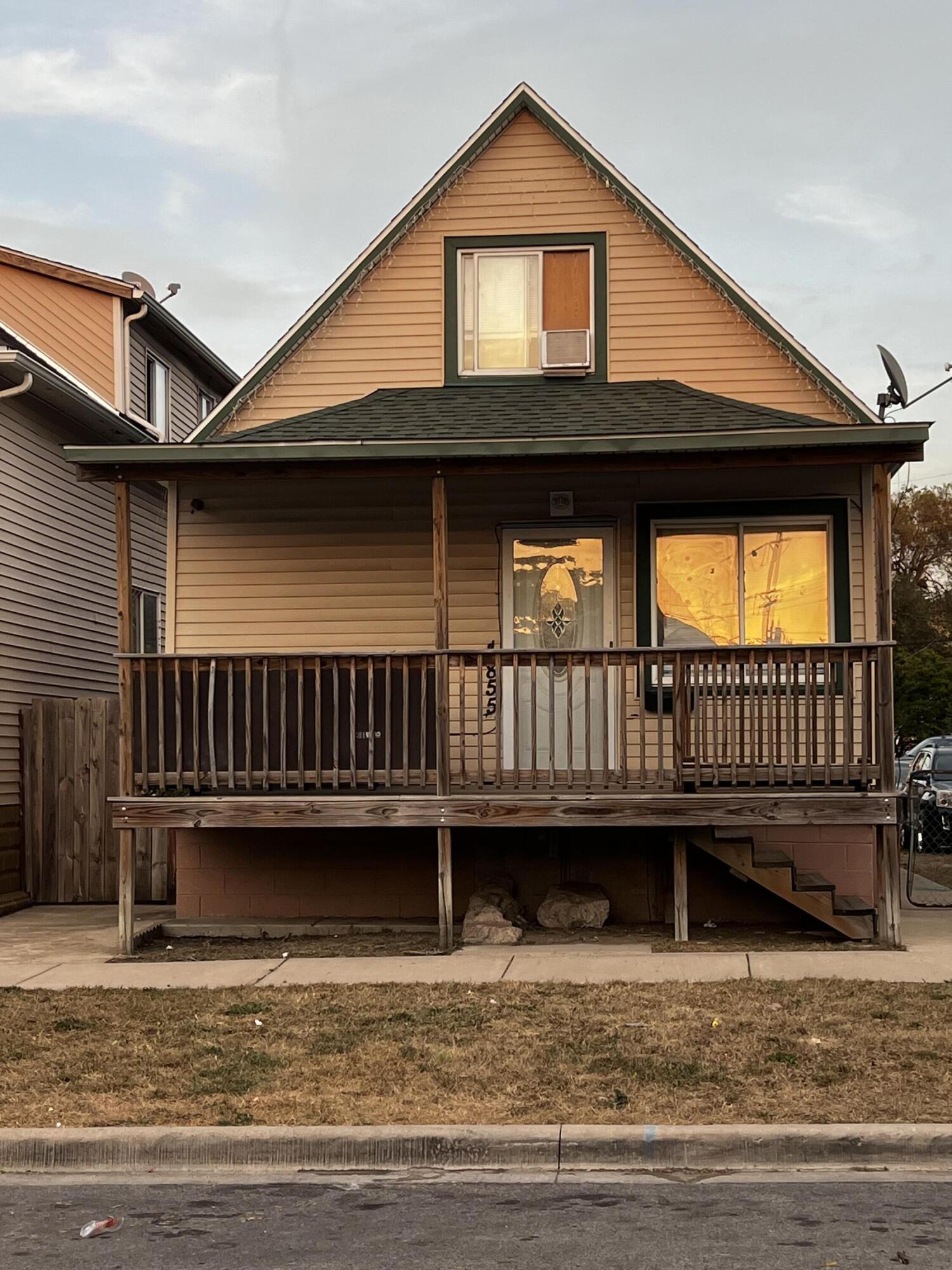 a view of a house with a balcony