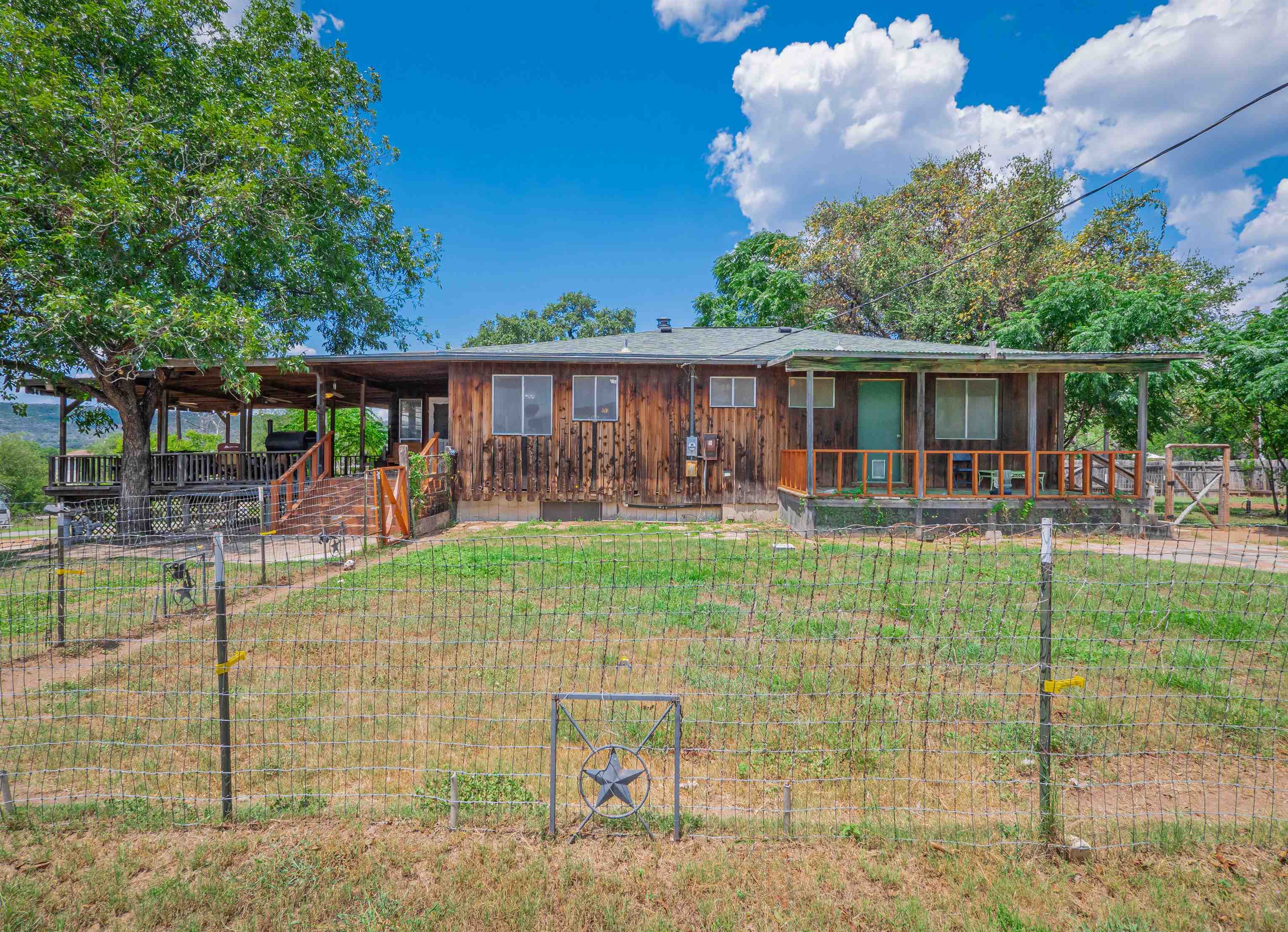 a view of a porch with a backyard